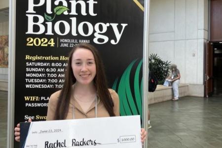 Rachel with check after winning ASPB2024 3-MT presentation